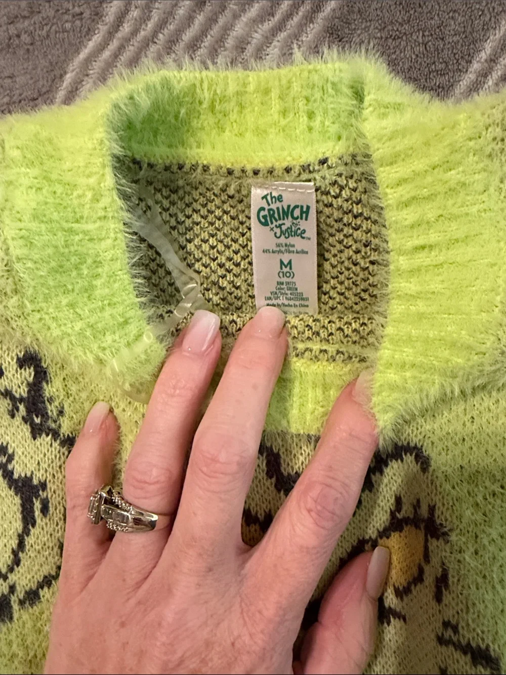 Justice Neon Green Grinch Face Fuzzy Sweater